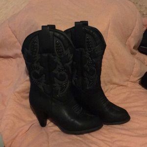 Black cowboy boots with a heal